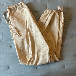 Women’s cream cargo adjustable ankle pants